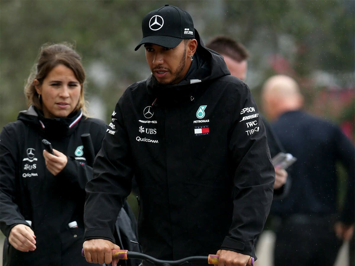 Hamilton leads Mercedes one-two in wet first American training