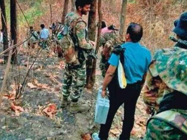 Odisha Polling staff trek 12 km in forest route to reach Tumudibandha